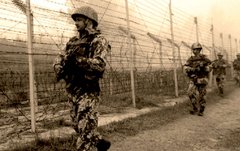 За стіною стіна