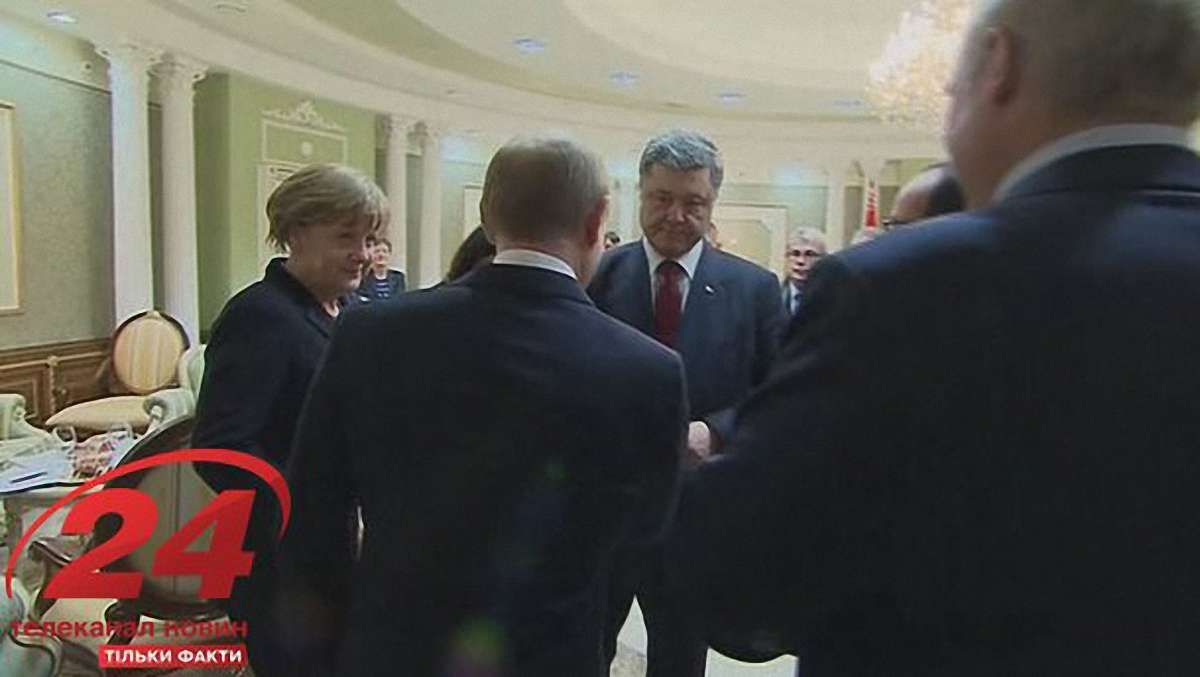Порошенко і Путін потиснули один одному руки