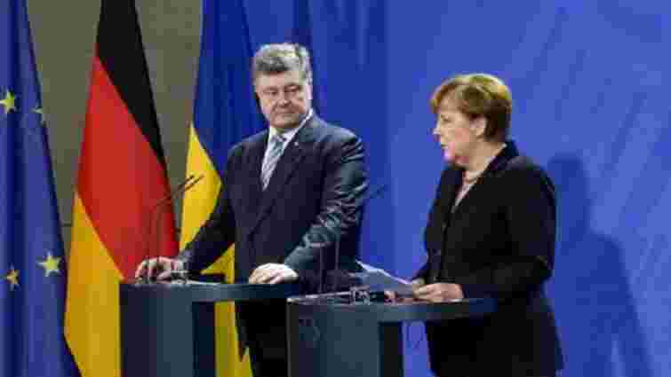 Меркель закликала Порошенка до виконання своєї частини Мінських угод