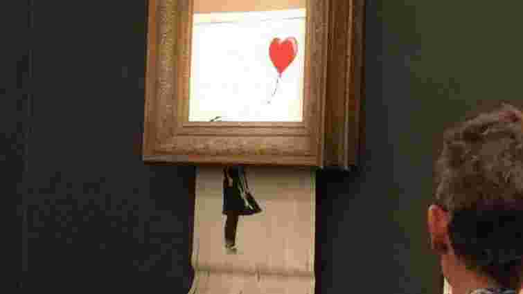 Картина художника Бенксі знищила себе одразу після продажу за мільйон фунтів