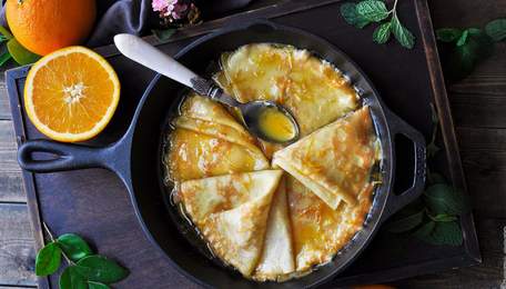 Крепс Сюзетт (млинці з апельсиновим соусом). Рецепт дня
