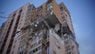 Російський снаряд влучив у 25-поверховий житловий будинок в Києві