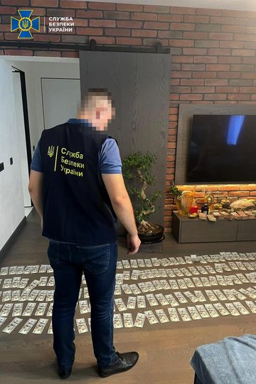 СБУ знайшла 8 млн грн в львівської чиновниці, яка переправляла ухилянтів за кордон 13