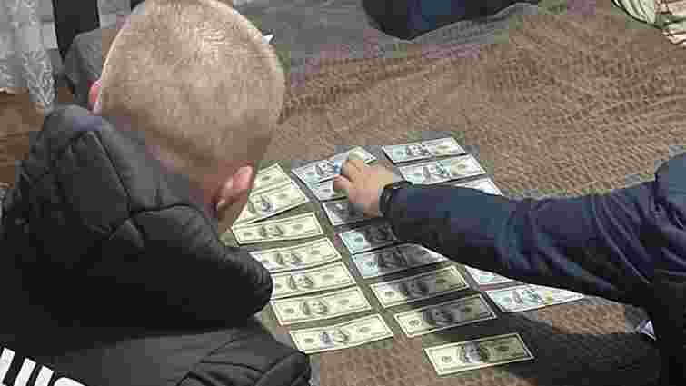 Банда з Київщини збувала фальшиві долари на території чотирьох західних областей