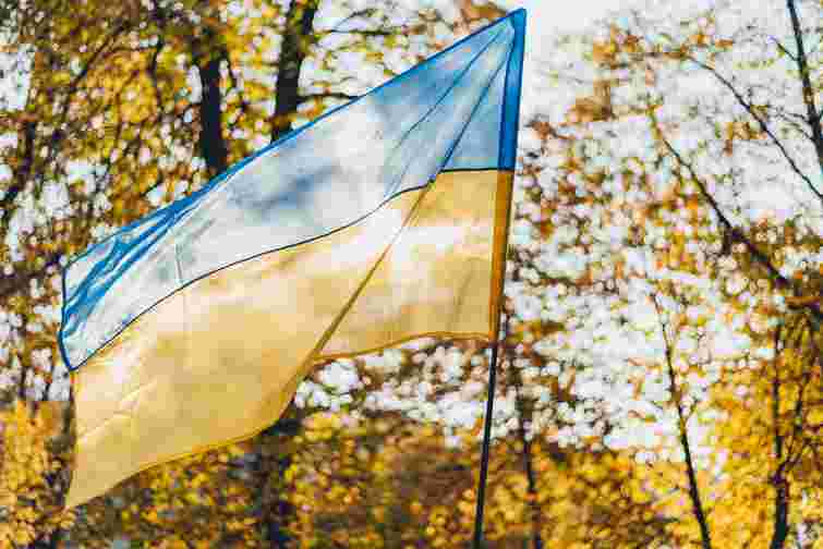 Москвичка заплатить 100 тис. грн за побиття сусіда і зневаження прапора України у Львові