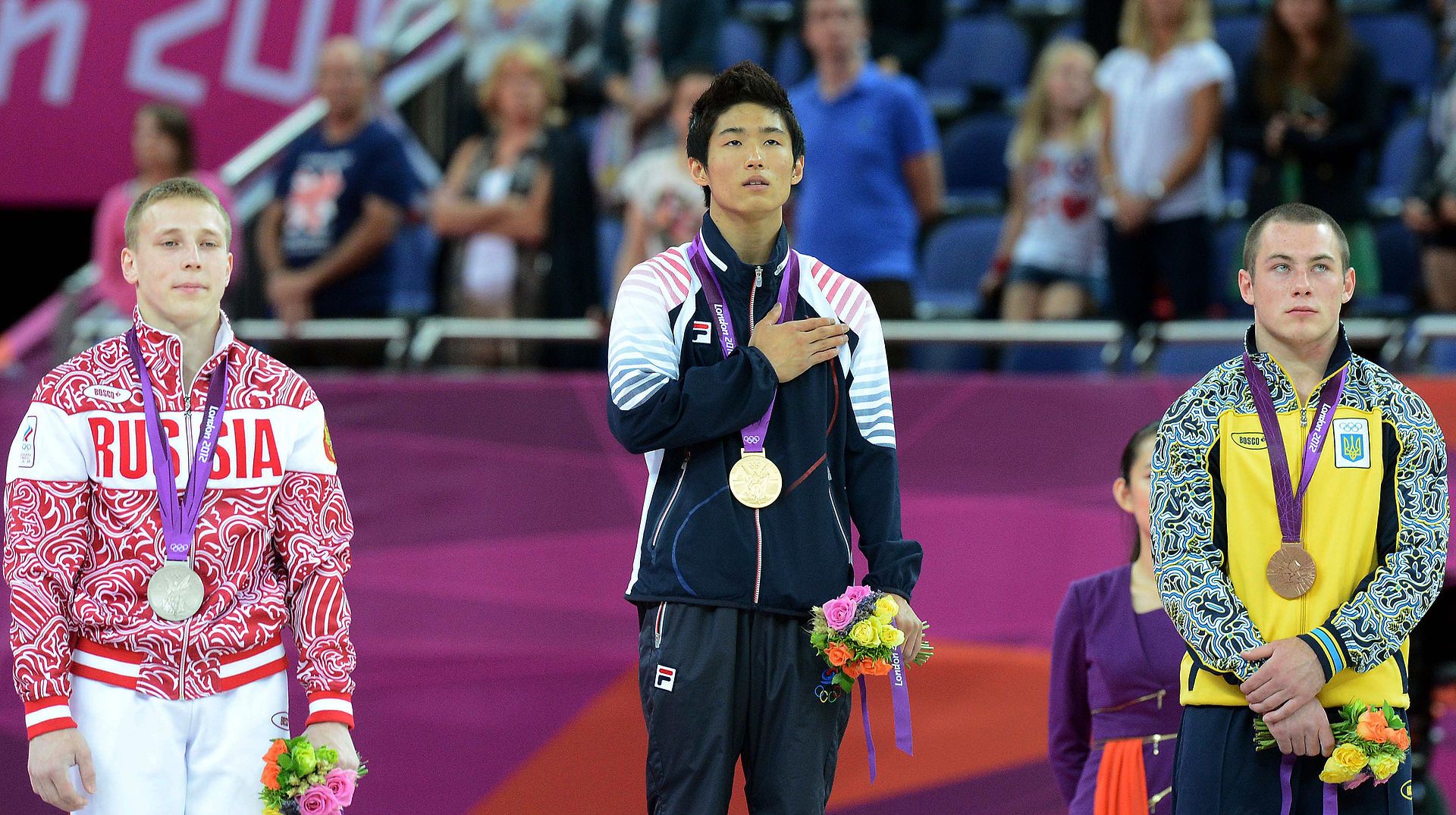 Ігор Радівілов (праворуч) на п'єдесталі XXX Літніх Олімпійських ігор 2012 року