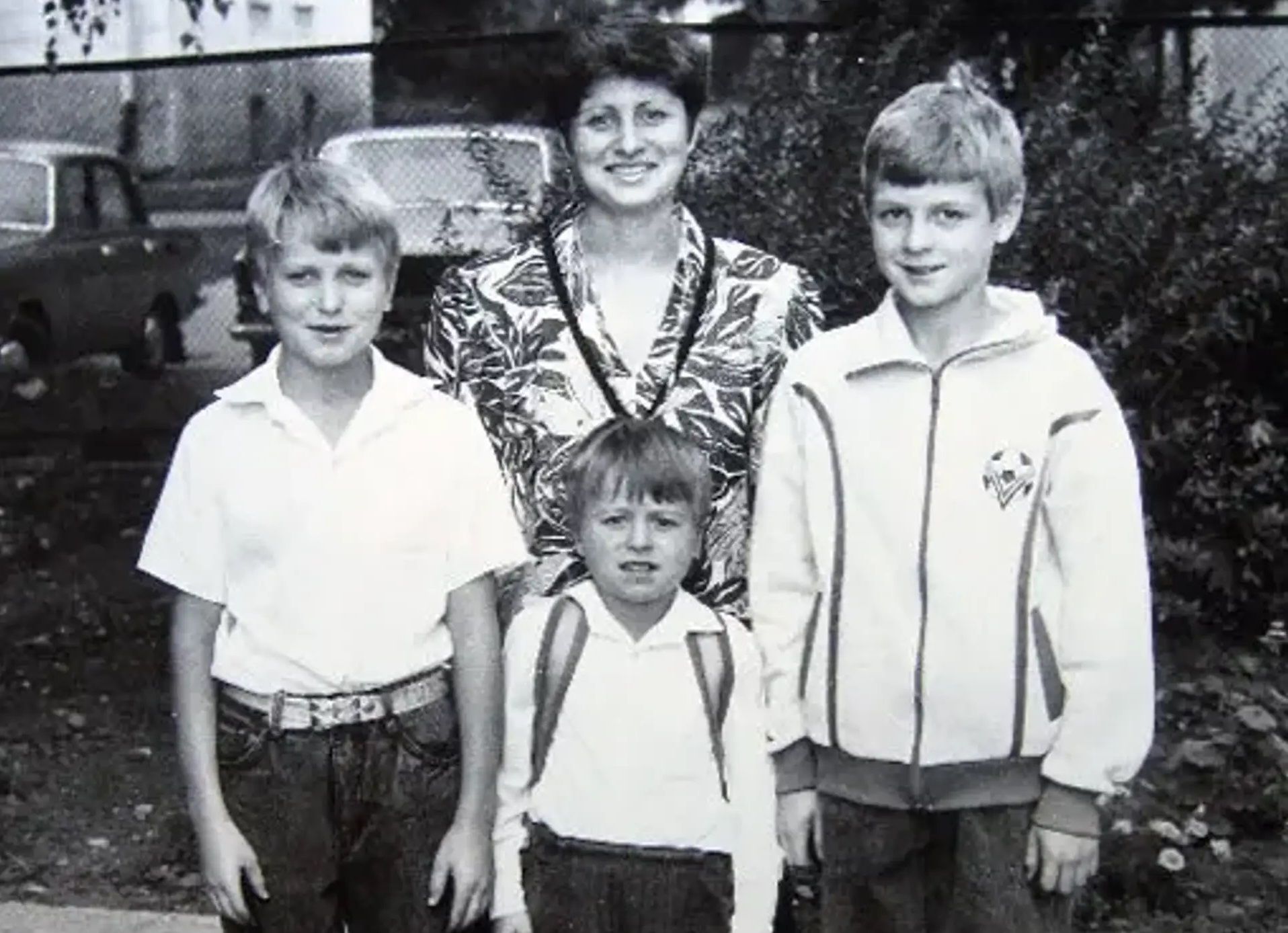 Руслан, Олексій і Петро Ротані з мамою Людмилою Петрівною