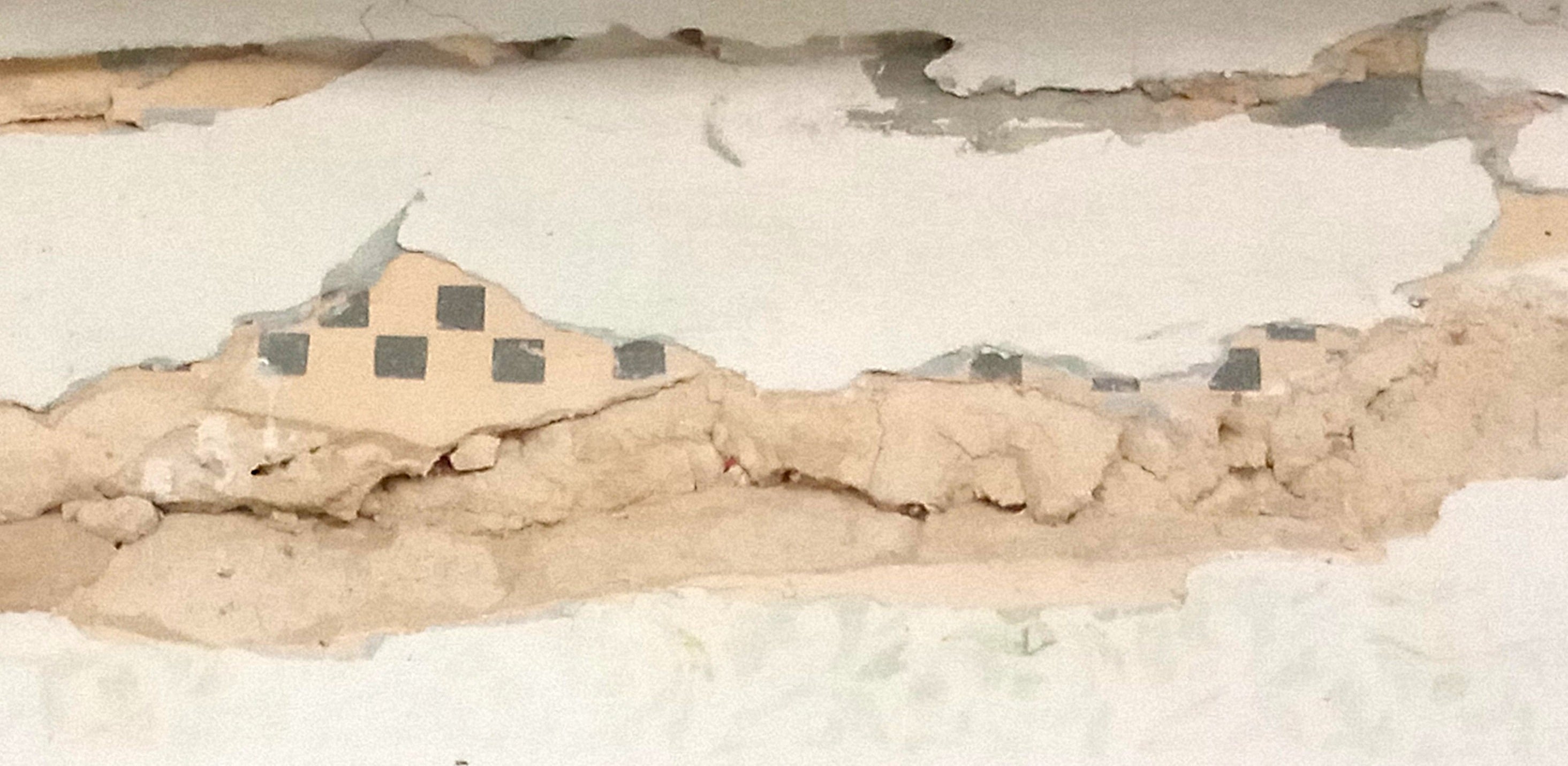 Стрічковий геометричний орнамент на штукатурці стіни однієї з кімнат