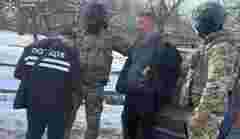 39-річного мешканця Львівщини затримали за вимагання 5 тис. доларів у колишньої