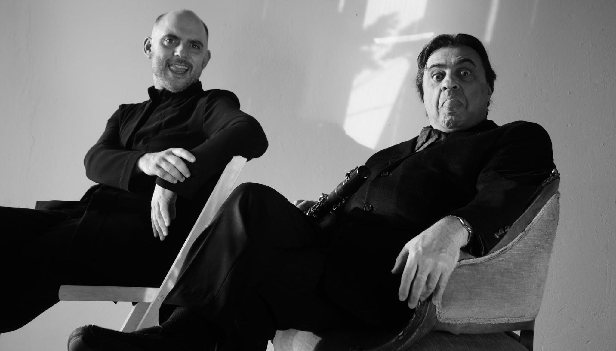 Ніколоз Рачвелі та Юліан Мілкіс